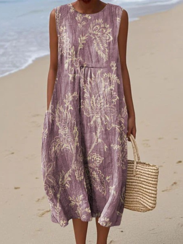 Vestido midi de mujer con estampado floral en tonos lila, sin mangas y ligero