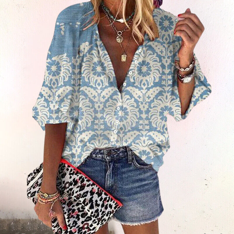 Blusa de vestir con estampado floral y manga tres cuartos