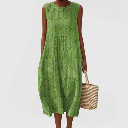Vestido midi elegante sin mangas con bolsillos laterales y tejido ligero para mujer, cómodo y versátil para verano o diario