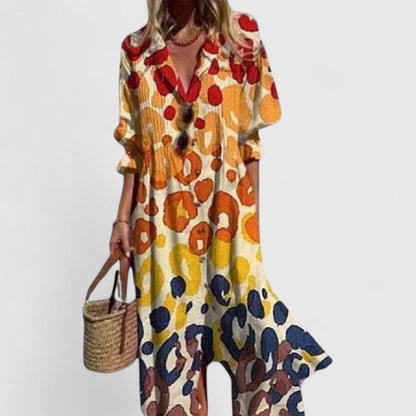 Vestido bohemio elegante con estampado artístico, escote en V con botones y falda midi fluida para mujer