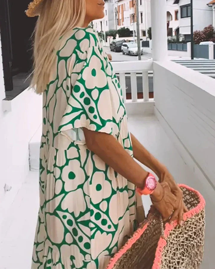 Vestido largo de verano con corte fluido y elegante estampado gráfico