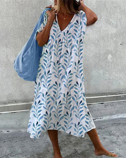 Coco | Vestido midi con estampado boho de hojas y corte vaporoso