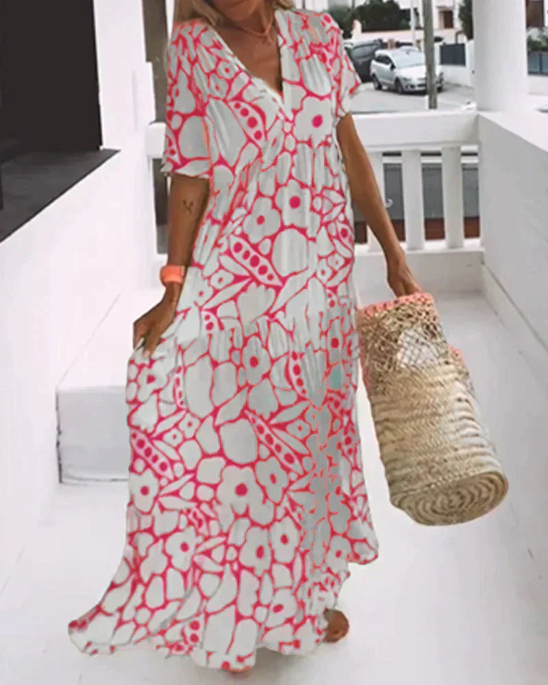 Vestido largo de verano con corte fluido y elegante estampado gráfico