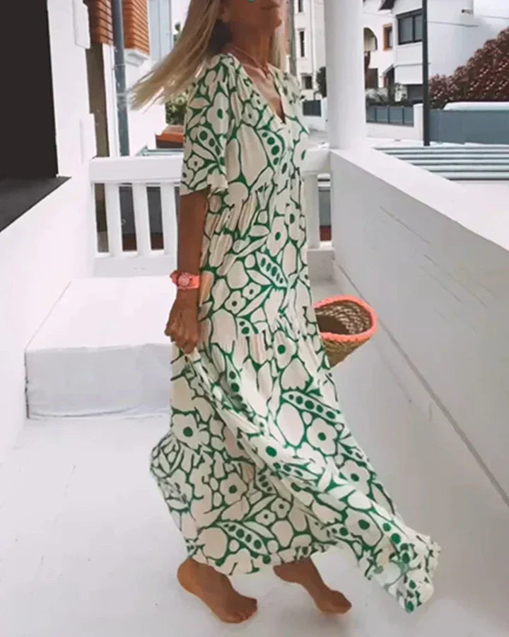 Vestido largo de verano con corte fluido y elegante estampado gráfico