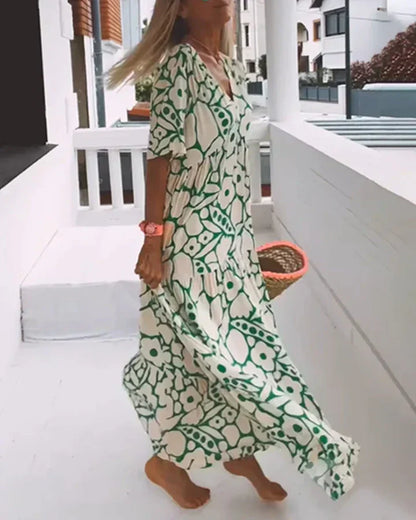 Vestido largo de verano con corte fluido y elegante estampado gráfico