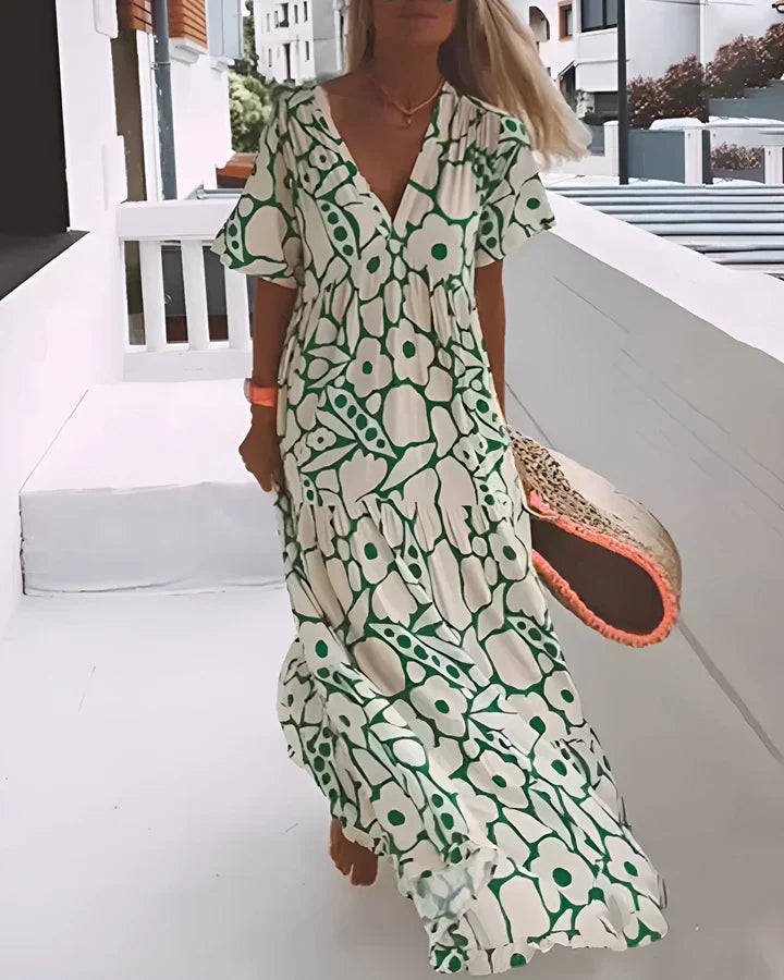 Vestido largo de verano con corte fluido y elegante estampado gráfico