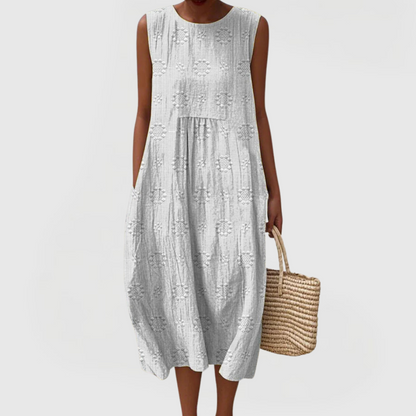 Vestido midi elegante sin mangas con bolsillos laterales y tejido ligero para mujer, cómodo y versátil para verano o diario