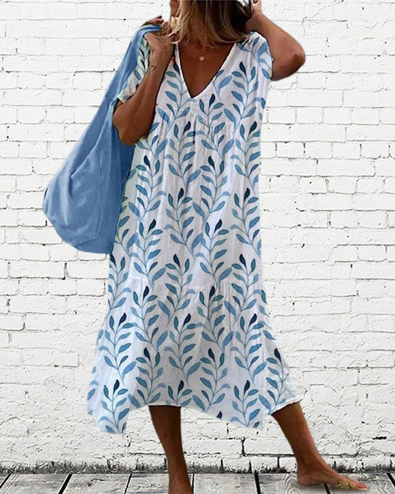 Coco | Vestido midi con estampado boho de hojas y corte vaporoso