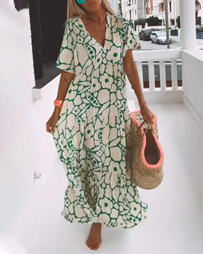 Vestido largo de verano con corte fluido y elegante estampado gráfico