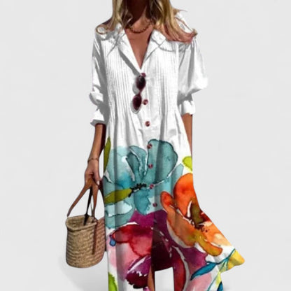 Vestido bohemio elegante con estampado artístico, escote en V con botones y falda midi fluida para mujer