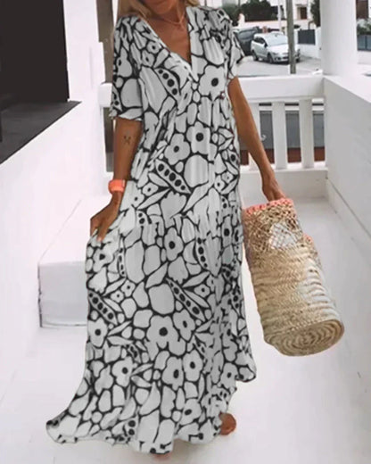 Vestido largo de verano con corte fluido y elegante estampado gráfico