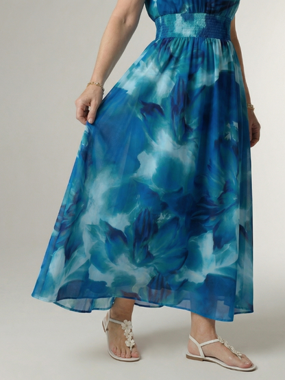 Vestido Midi con Estampado Floral Recogido y Cuello Halter | Diseño Elegante