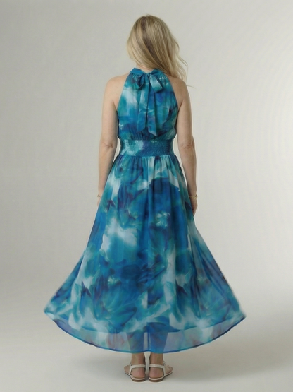Vestido Midi con Estampado Floral Recogido y Cuello Halter | Diseño Elegante
