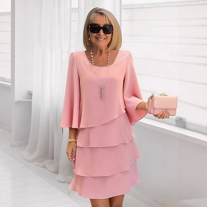 Elegante vestido midi con volantes