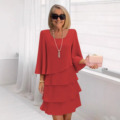 Elegante vestido midi con volantes