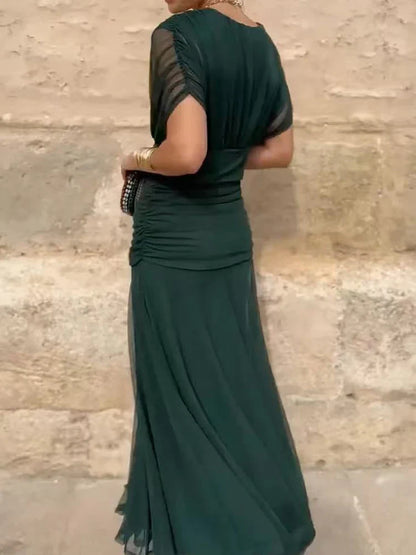 Maxivestido elegante de gasa con escote cruzado y manga fluida