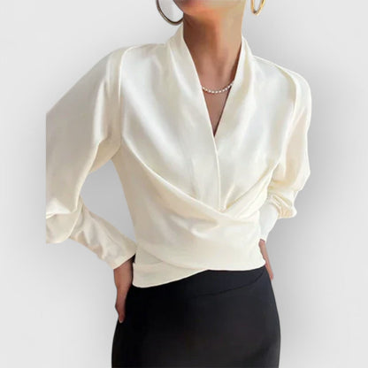 Camisa chic con mangas abullonadas, elegante y ideal para ocasiones especiales