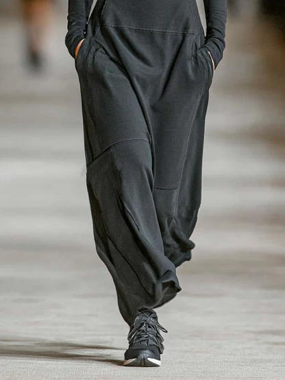 Vestido largo negro para mujer con cuello alto, cremallera frontal y corte holgado, cómodo y moderno