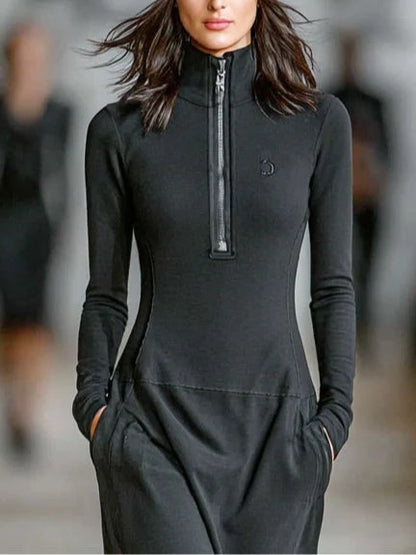 Vestido largo negro para mujer con cuello alto, cremallera frontal y corte holgado, cómodo y moderno