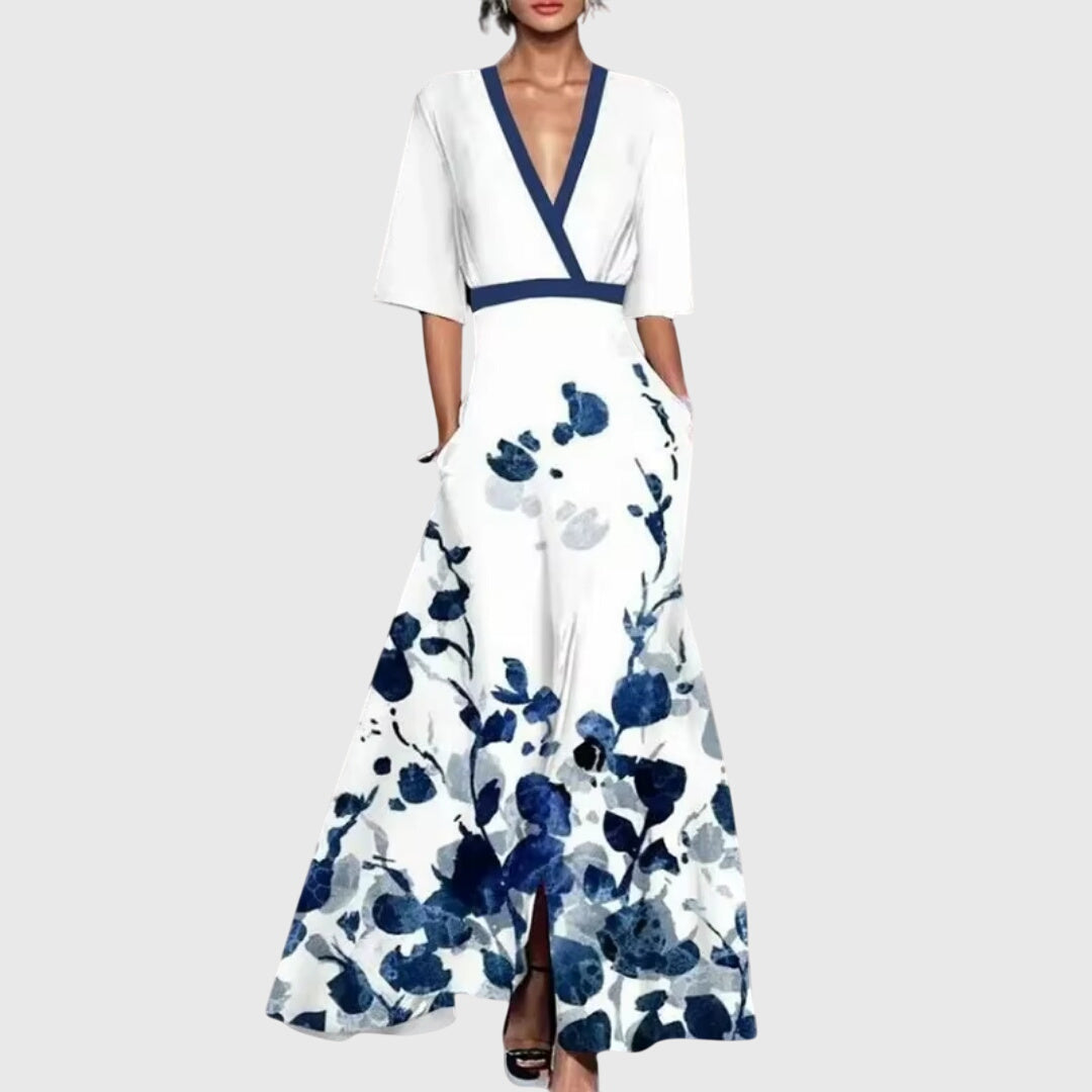 Vestido elegante de primavera con escote en V cruzado, estampado floral vibrante y falda maxi fluida para mujer