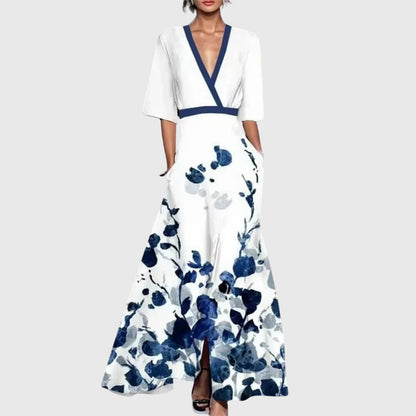 Vestido elegante de primavera con escote en V cruzado, estampado floral vibrante y falda maxi fluida para mujer