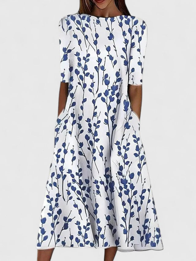 Elegante vestido midi con estampado floral azul para mujer, con mangas cortas, cintura ajustada y falda fluida