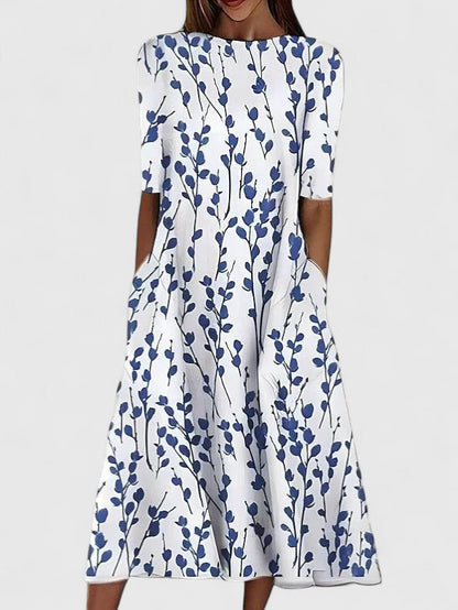 Elegante vestido midi con estampado floral azul para mujer, con mangas cortas, cintura ajustada y falda fluida