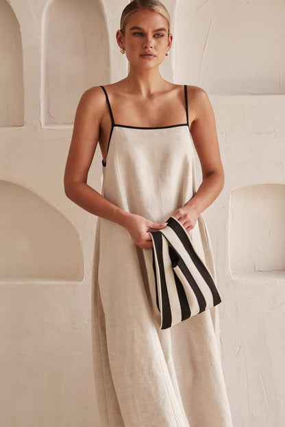 Vestido maxi de lino con corte trapezoidal y tirantes ajustables para mujer