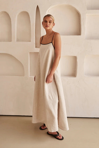 Vestido maxi de lino con corte trapezoidal y tirantes ajustables para mujer