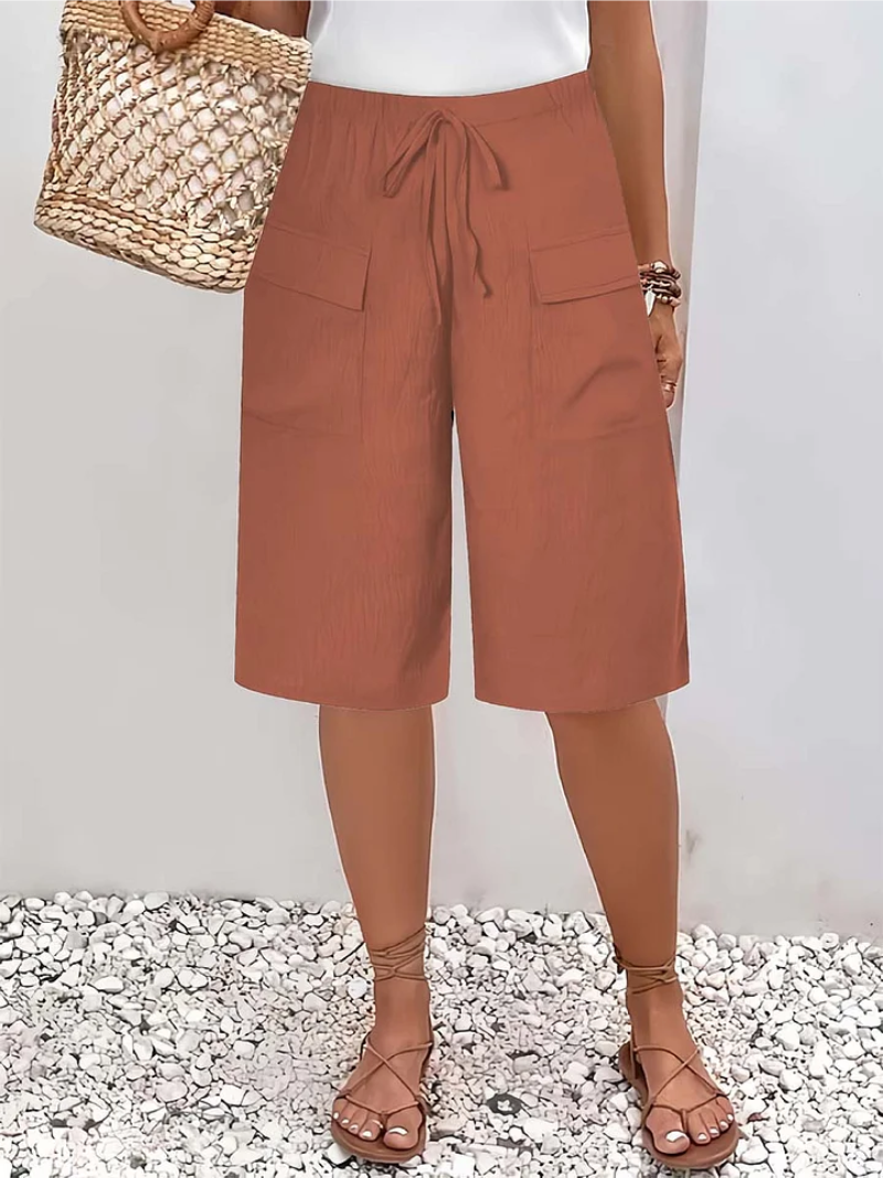 Pantalones cortos con cintura elástica para mujer, modernos y versátiles