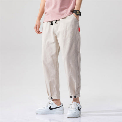 Pantalones ajustados para hombre confeccionados en tejido ligero y transpirable, con un corte moderno y un ajuste cómodo