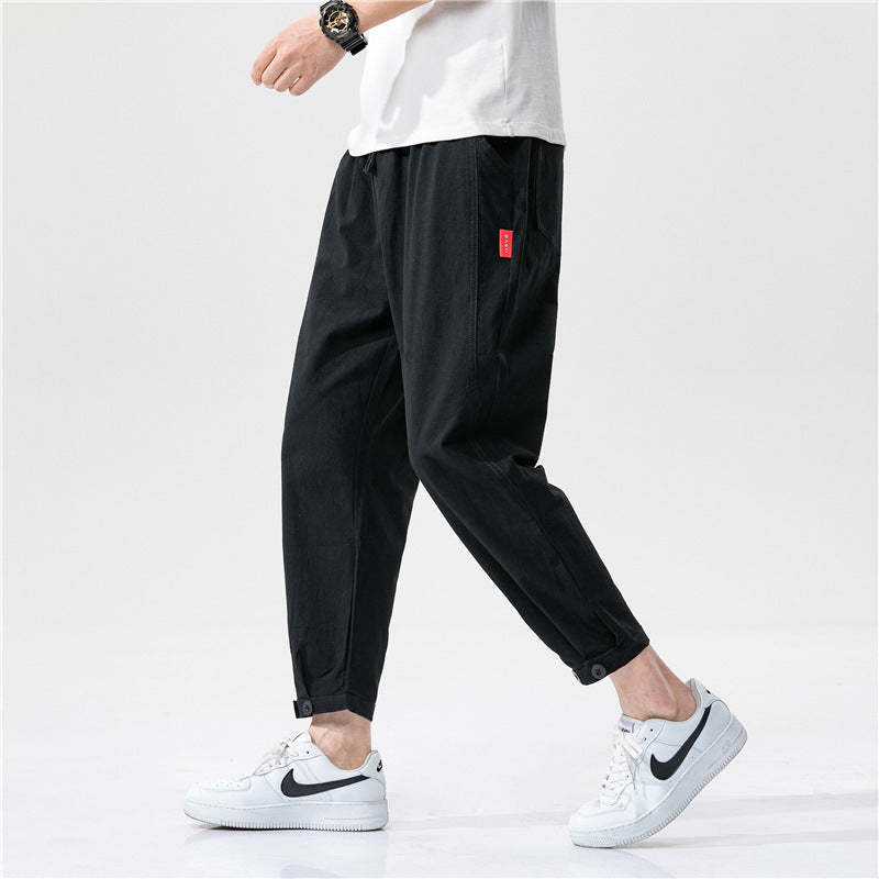 Pantalones ajustados para hombre confeccionados en tejido ligero y transpirable, con un corte moderno y un ajuste cómodo
