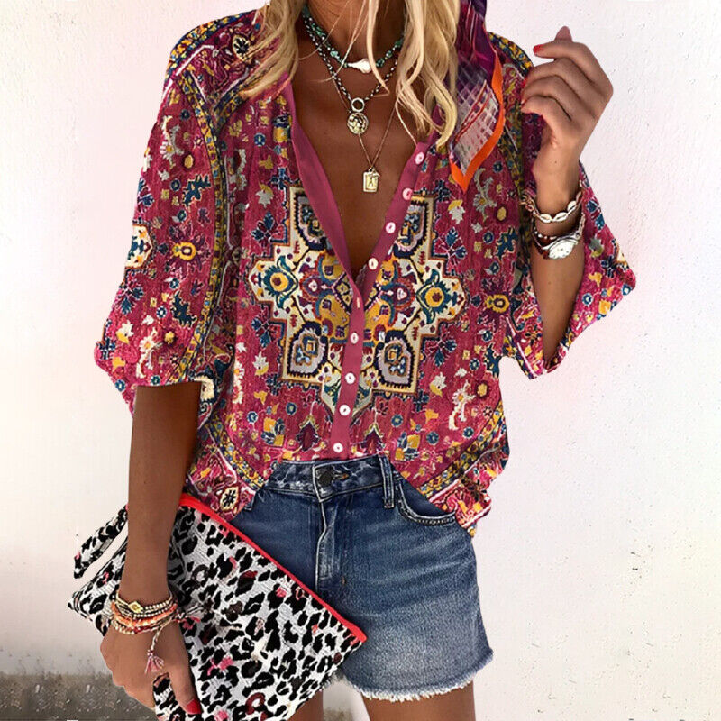 Blusa de vestir con estampado floral y manga tres cuartos