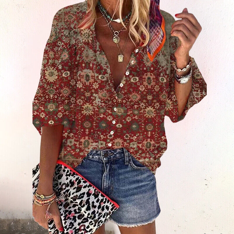 Blusa de vestir con estampado floral y manga tres cuartos