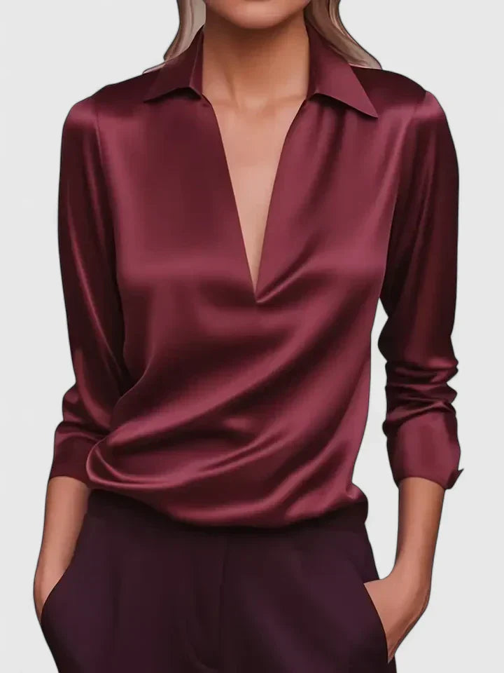 Blusa de vestir con cuello drapeado y manga larga