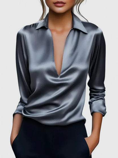 Blusa de vestir con cuello drapeado y manga larga