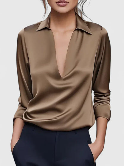 Blusa de vestir con cuello drapeado y manga larga