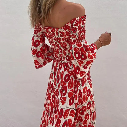 Vestido largo con estampado floral, hombros descubiertos y mangas acampanadas