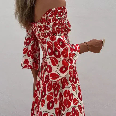 Vestido largo con estampado floral, hombros descubiertos y mangas acampanadas