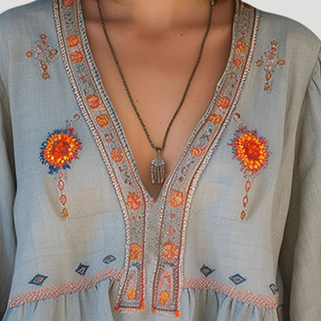 Blusa bordada de manga larga con cuello en V para mujer