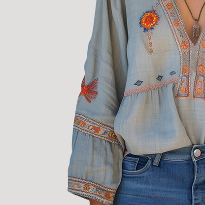 Blusa bordada de manga larga con cuello en V para mujer