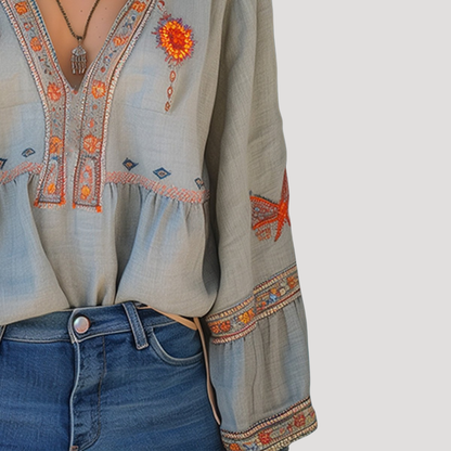 Blusa bordada de manga larga con cuello en V para mujer