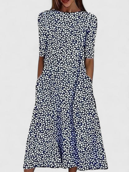 Elegante vestido midi con estampado floral azul para mujer, con mangas cortas, cintura ajustada y falda fluida